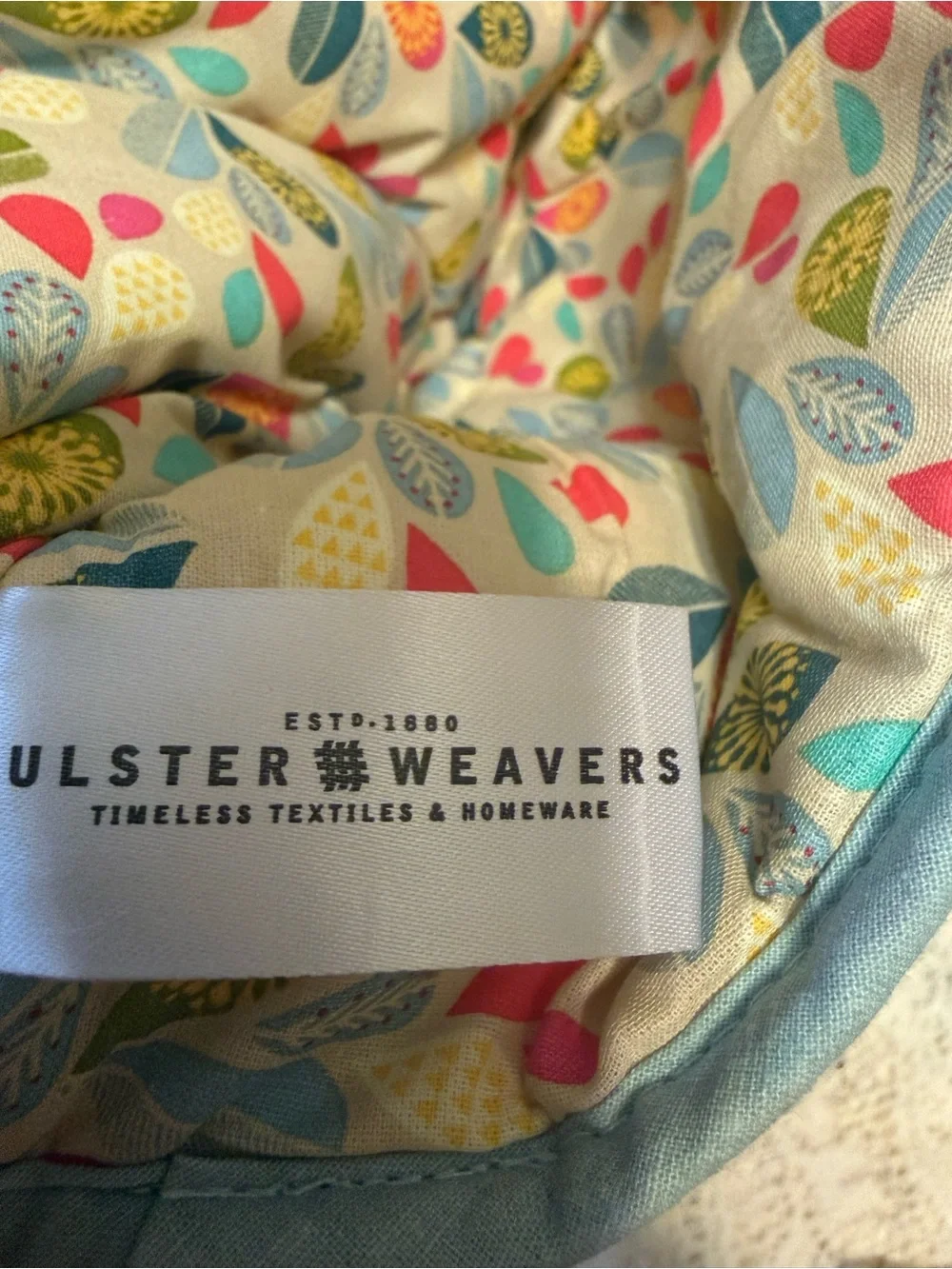 This is an Ulster Weavers cat-shaped tea cosy